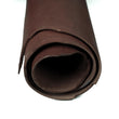 Load image into Gallery viewer, Close up of rolled ChahinLeather Sunset Harness