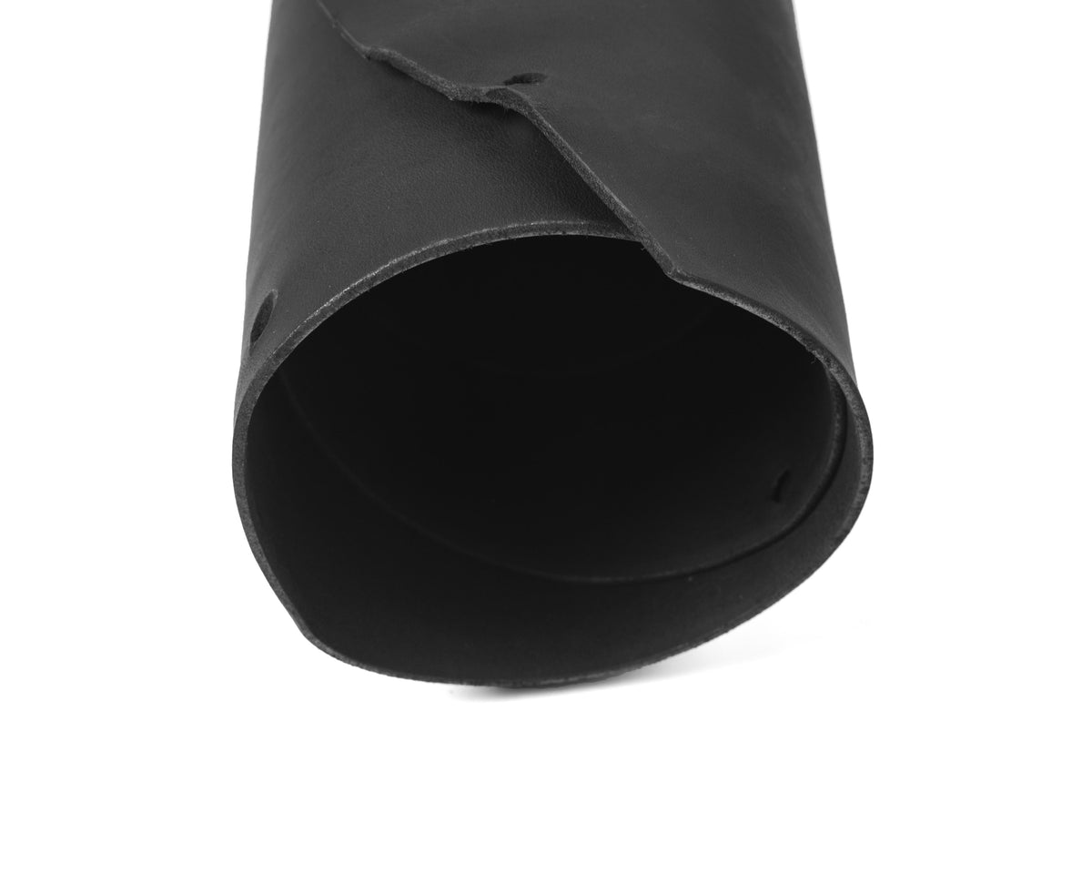Close up of rolled ChahinLeather Black Holster Strap