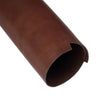 Load image into Gallery viewer, Rolled side of medium brown bridle penetrated with colorfast
