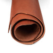 Load image into Gallery viewer, Close up of rolled ChahinLeather Dark Chestnut Skirting
